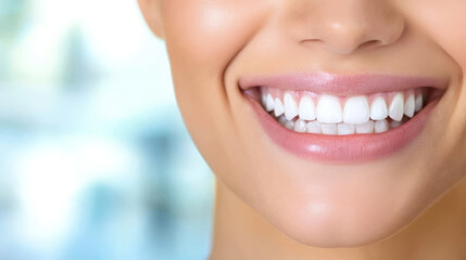 Obraz premium young woman smiling broadly, showcasing her bright white teeth and joyful expression. Her radiant smile conveys happiness and confidence in bright setting