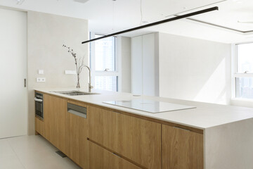 White kitchen furniture gives a clean and modern feel