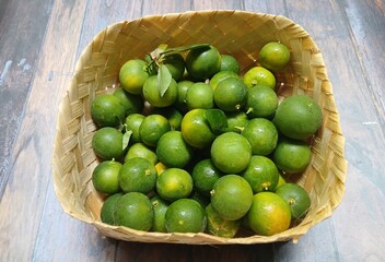 Fresh citrus on wooden background