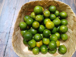 Fresh citrus on wooden background