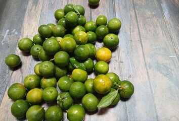 Fresh citrus on wooden background