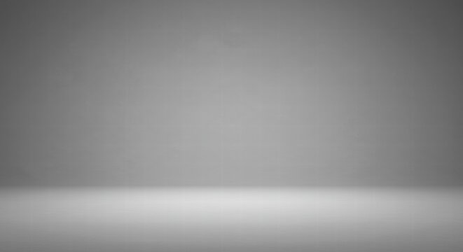 Minimalist Gray Studio Background:  A blank canvas of subtle gray tones, perfectly balanced for showcasing products, creating a sense of simplicity and elegance. Ideal for product photography.