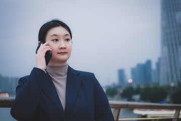 Professional Woman Engaged in Business Conversation in Urban Setting