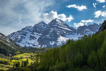 Majestic Maroon Bells under a cloudy sky in Aspen