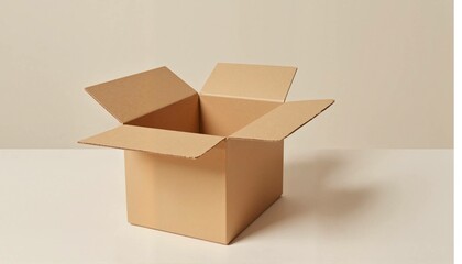Empty brown cardboard box on a light beige background with copy space for text or graphics