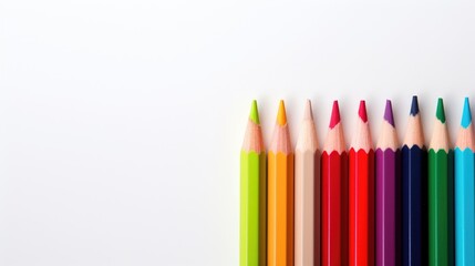 Vibrant colored pencils arranged neatly on a clean white background ideal for artistic concepts and creative design themes.