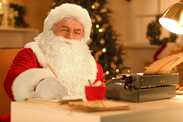 Santa Claus with typewriter taking notes while writing Christmas story at night