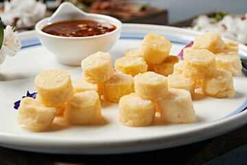 Deep-fried Japanese tofu cubes with dipping sauce