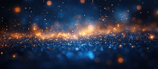 Obraz premium Blue Christmas backdrop with shimmering bokeh lights creating a festive atmosphere perfect for holiday themes and seasonal designs