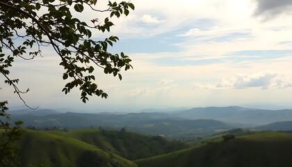 Obraz premium Serene Mountain Landscape Under a Cloudy Sky