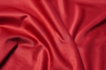 red cloth with ripples and waves texture background