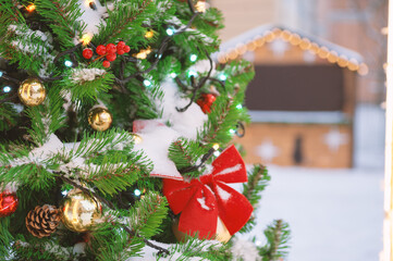 Festive pine tree decoration captured with a cozy, bokeh-filled background