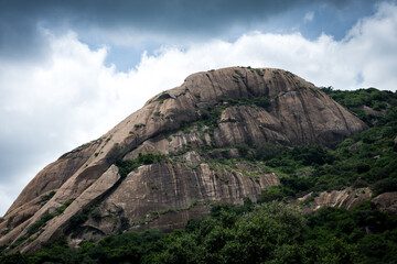 Savandurga hills, it is situated at 60 km west of Bengaluru, Karnataka, India. It is the largest monolith hills in Asia famous for trekking, rock climbing and a pilgrim.