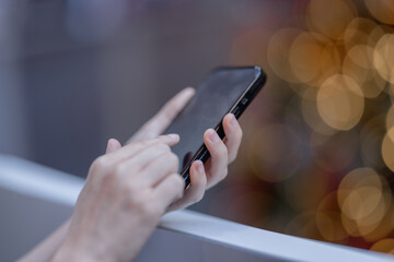 Social media and digital online concept, man using smart phone. The concept of living on vacation and playing social media. Social Distancing ,Working From Home