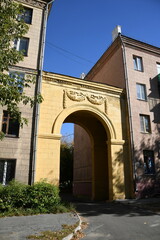 Architecture of old Soviet Union houses in Stalin's Empire style. Exterior of the facade of a vintage residential building in Russia