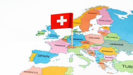 A map of Switzerland with the national flag of Switzerland on it. The flag is a white cross in the center of a square red field