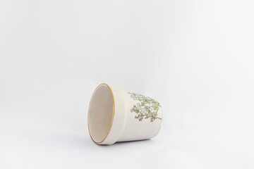 White ceramic flower pot on white isolated background