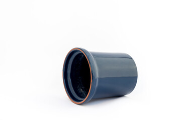 Blue empty ceramic planter on white isolated background