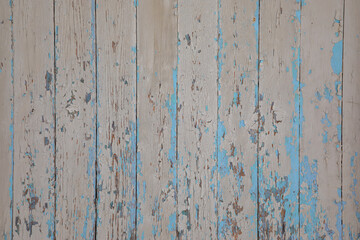 white blue grey cracked paint on wooden fence background texture