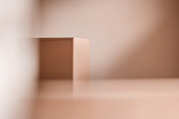 Minimalist composition with soft mocha tones featuring abstract geometric shapes and smooth gradients in a serene atmosphere