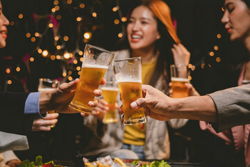 A cheerful group of friends enjoying wine and food on a sunny patio. Toasting with wineglasses, they celebrate togetherness in a scenic outdoor setting, blending fun, friendship, and a festive mood.