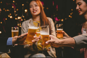 A cheerful group of friends enjoying wine and food on a sunny patio. Toasting with wineglasses, they celebrate togetherness in a scenic outdoor setting, blending fun, friendship, and a festive mood.