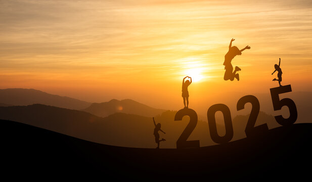 Joyful celebration of a new year as people leap into the sunset, symbolizing hope, aspiration, and new beginnings in the year 2025 against a stunning natural backdrop.