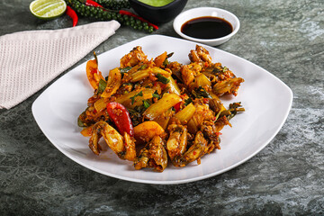 Vietnamese cuisine - fried frog with vegetables