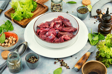 Raw deer meat, raw meat.