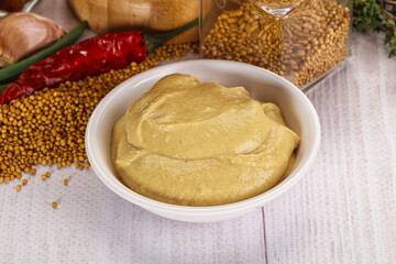 Dijon mustard sauce in the bowl