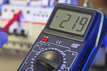 A digital multimeter for measuring the parameters of electrical circuits. Close-up. Soft focus.