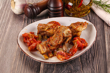 Baked lamb ribs with vegetables