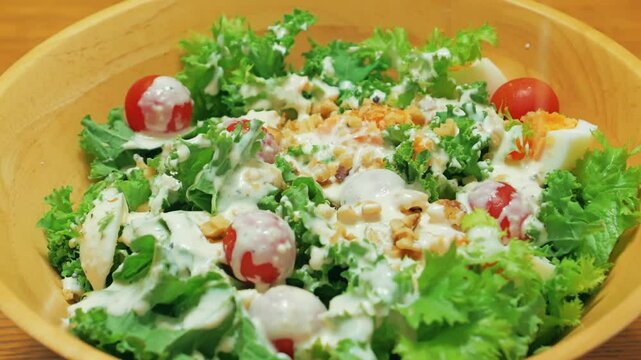 Season vegetable salad with white Caesar dressing.