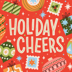 lettering holiday cheers with Christmas ornaments and presents