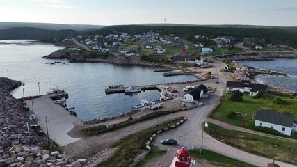 Drone shot of Neils Harbour and countryside at Cape Breton, Nova Scotia