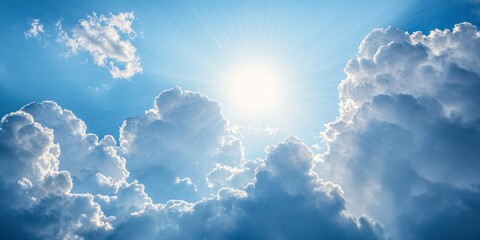 A stunning close up of clouds features powerful sun rays piercing through them. The dramatic clouds create a captivating backdrop against a beautiful blue sky adorned with the sun and clouds.