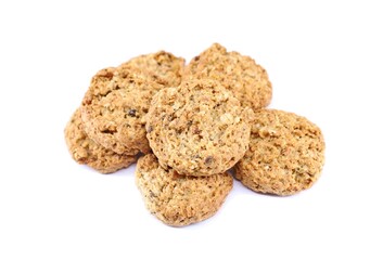 Granola cookies with dried apricot and orange on white background.