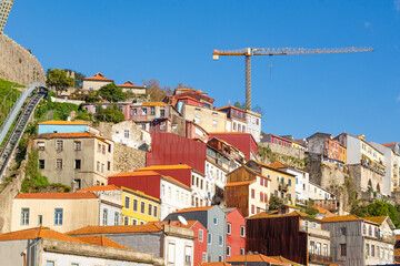 Porto, Portugal - November 9, 2024 : Various facades of old buildings, in Cais da Ribeira,