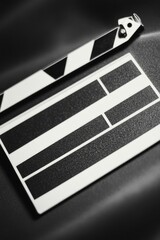 A classic film set prop, a clap board in monochrome