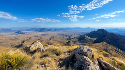 Fototapeta premium Breathtaking mountain landscape with rocky terrain and blue sky