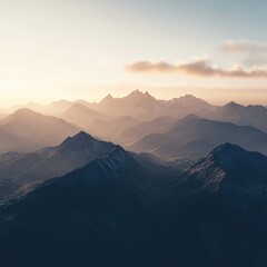 Serene sunset over layered mountain ranges.