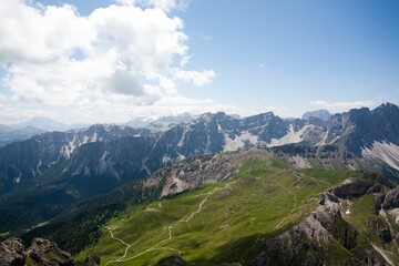 Obraz premium Breathtaking Dolomites view with lush valleys.