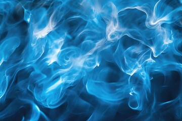 Fototapeta premium A close-up shot of blue smoke on a black background, great for use in abstract art or design projects