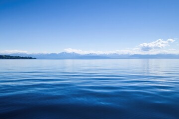 Obraz premium A serene mountain lake surrounded by towering peaks