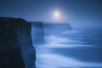 Stretching seaside cliffs are softly illuminated by the moon against a backdrop of tranquil water,...