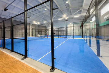  Paddle tennis blue court without people 