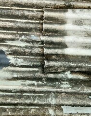 Asbestos has been exposed to rain for a long time