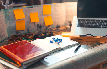 Dice place on journal book create adventure story role playing tabletop game and board games