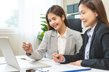 Business meeting, asian group woman brainstorm analysis on graph data of cost plan or document, paperwork and discussing in board room on table at office. People working together, financial advisor.