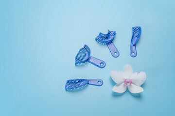 Set of dental pliant impression trays.